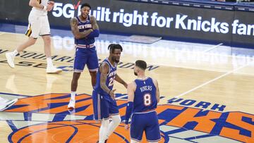 Jan 6, 2021; New York, New York, USA; New York Knicks forward Reggie Bullock (25) celebrates with guard Austin Rivers (8) during the Knicks 112-100 victory over the Utah Jazz at Madison Square Garden. Mandatory Credit: Wendell Cruz-USA TODAY Sports
