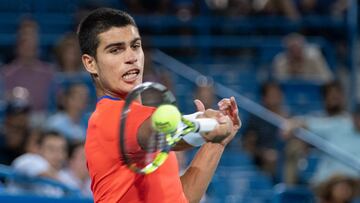 Aug 19, 2022; Cincinnati, OH, USA; Carlos Alcaraz (ESP) returns a shot during his match against Cameron Norrie (GBR) at the Western & Southern Open at the Lindner Family Tennis Center. Mandatory Credit: Susan Mullane-USA TODAY Sports