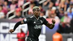 Juventus' midfielder Paul Pogba runs with the ball against Chivas de Guadalajara in Las Vegas, Nevada on July 22, 2022 for their Soccer Champions Tour match at Allegiant Stadium. (Photo by Frederic J. BROWN / AFP)