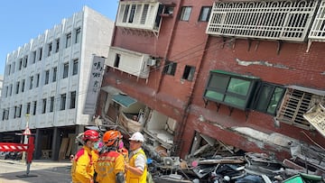 Firefighters work at the site where a building collapsed following the earthquake, in Hualien, Taiwan, in this handout provided by Taiwan's National Fire Agency on April 3, 2024. Taiwan National Fire Agency/Handout via REUTERS  ATTENTION EDITORS - THIS IMAGE WAS PROVIDED BY A THIRD PARTY. NO RESALES. NO ARCHIVES.     TPX IMAGES OF THE DAY