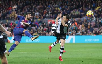 Luis Suárez scores the second goal of the game.