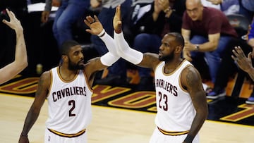 CLEVELAND, OH - JUNE 09: Kyrie Irving #2 and LeBron James #23 of the Cleveland Cavaliers celebrate after a play in the first quarter against the Golden State Warriors in Game 4 of the 2017 NBA Finals at Quicken Loans Arena on June 9, 2017 in Cleveland, Ohio. NOTE TO USER: User expressly acknowledges and agrees that, by downloading and or using this photograph, User is consenting to the terms and conditions of the Getty Images License Agreement.   Gregory Shamus/Getty Images/AFP
 == FOR NEWSPAPERS, INTERNET, TELCOS &amp; TELEVISION USE ONLY ==