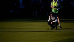SCOTTSDALE, ARIZONA - FEBRUARY 11: Nick Taylor of Canada and caddie Dave Markle line up a putt on the 18th green during the final round of the WM Phoenix Open at TPC Scottsdale on February 11, 2024 in Scottsdale, Arizona.