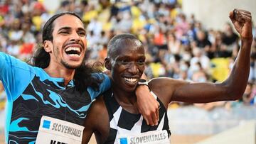 Second-placed Spain&#039;s Mohamed Katir (L) and first-placed Kenya&#039;s Timothy Cheruiyot celebrate after competing in the Men&#039;s 1500m during the IAAF Diamond League competition on July 9, 2021 in Monaco. (Photo by CLEMENT MAHOUDEAU / AFP)