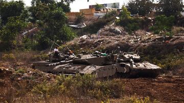 Israeli soldiers sit on a tank near Israel's border with Lebanon in northern Israel, October 19, 2023. REUTERS/Lisi Niesner