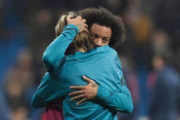 Marcelo hugs Luka Modric before Real Madrid's Champions League lasy-16 first leg against Paris Saint-Germain last week.