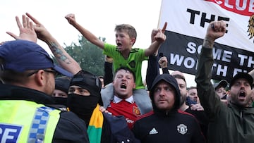 Soccer Football - Premier League - Manchester United fans protest ahead of Liverpool match - Old Trafford, Manchester, Britain - August 22, 2022 Fans with a banner protesting the Glazer family’s ownership of the club outside the stadium before the match Action Images via Reuters/Carl Recine