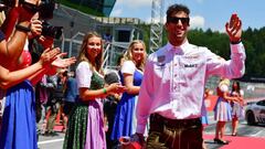 Red Bullx92s Australian driver Daniel Ricciardo wears traditional &quot;Lederhosen&quot; (leather trousers) as he arrives prior to the Austrian Formula One Grand Prix in Spielberg, central Austria, on July 1, 2018. / AFP PHOTO / Andrej ISAKOVIC