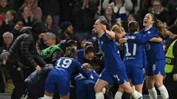 Chelsea's players celebrate after winning the shoot-out after the UEFA Women's Champions League quarter-final second leg football match between Chelsea and Lyon at Stamford Bridge, in London, on March 30, 2023. - Chelsea won the game 4-3 on penalties after the tie ended 2-2 on aggregate. (Photo by JUSTIN TALLIS / AFP) (Photo by JUSTIN TALLIS/AFP via Getty Images)