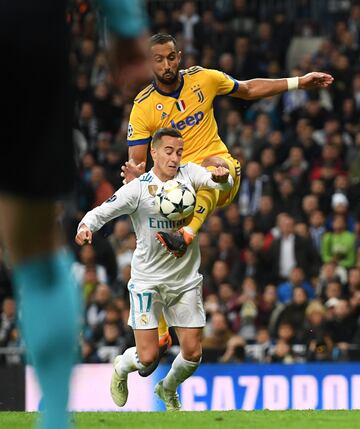 Medhi Benatia of Juventus fouls Lucas Vazquez of Real Madrid, leading to a penalty being awarded during the UEFA Champions League Quarter Final Second Leg match between Real Madrid and Juventus.