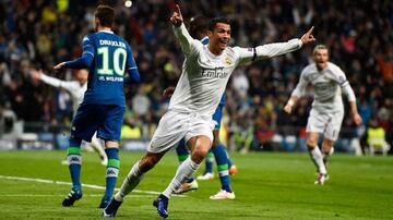 Cristiano Ronaldo of Real Madrid celebrates as he scores their second goal during the UEFA Champions League quarter final second leg match between Real Madrid CF and VfL Wolfsburg at Estadio Santiago Bernabeu on April 12, 2016 in Madrid, Spain.