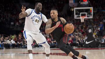 Mar 9, 2018; Portland, OR, USA; Portland Trail Blazers guard Damian Lillard (0) drives to the basket during the second half against Golden State Warriors forward Draymond Green (23) at the Moda Center. The Trail Blazers won 125-108. Mandatory Credit: Troy