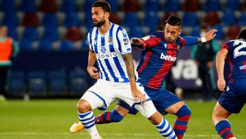 Real Sociedad's Brazilian forward Willian Jose Da silva (L) vies with Levante's Spanish forward Sergio Leon during the Spanish league football match between Levante UD and Real Sociedad at the Ciutat de Valencia stadium in Valencia on December