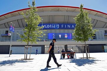 Soccer Football - Champions League Final - Preview - Wanda Metropolitano, Madrid, Spain - May 29, 2019 A Spanish police officer walks outside the stadium. 