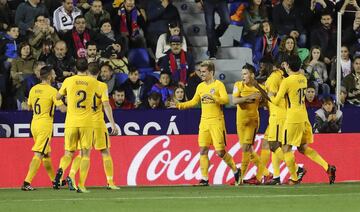 Atlético's players celebrate Gameiro's goal.