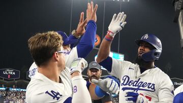 Los Angeles (United States), 12/10/2024.- Los Angeles Dodgers left fielder Teoscar Hernandez (R) high fives Los Angeles Dodgers' Enrique Hernandez (L) after hitting a home run during the Major League Baseball (MLB) National League Division Series playoff game five between the San Diego Padres and the Los Angeles Dodgers in Los Angeles, California, USA, 11 October 2024. The series is the best-of-five games. EFE/EPA/ALLISON DINNER