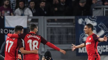 Sevilla&#039;s French forward Wissam Ben Yedder (R) celebrates with Sevilla&#039;s Spanish midfielder Pablo Sarabia (L) and Sevilla&#039;s Spanish defender Sergio Escudero after opening the scoring during the UEFA Europa League round of 16 first leg footb