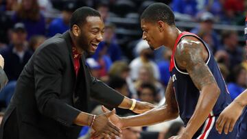 AUBURN HILLS, MI - APRIL 10: Bradley Beal #3 of the Washington Wizards celebrates with John Wall #2 after a fourth quarter dunk while playing the Detroit Pistons at the final NBA game at the Palace of Auburn Hills on April 10, 2017 in Auburn Hills, Michigan. NOTE TO USER: User expressly acknowledges and agrees that, by downloading and or using this photograph, User is consenting to the terms and conditions of the Getty Images License Agreement.   Gregory Shamus/Getty Images/AFP
 == FOR NEWSPAPERS, INTERNET, TELCOS &amp; TELEVISION USE ONLY ==