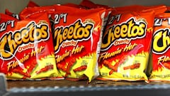 A new bill seeks to ban Flamin' Hot Cheetos, certain brands of cereal, and other snacks in California schools, due to the chemicals they contain.