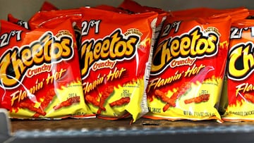 A new bill seeks to ban Flamin' Hot Cheetos, certain brands of cereal, and other snacks in California schools, due to the chemicals they contain.