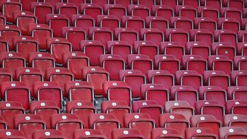 Empty seats are seen in the stadium ahead of the German first division Bundesliga football match VfB Stuttgart vs VfL Wolfsburg, in Stuttgart, southern Germany, on April 21, 2021. (Photo by KAI PFAFFENBACH / POOL / AFP) / DFL REGULATIONS PROHIBIT ANY USE