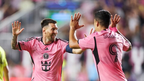 Mar 13, 2024; Fort Lauderdale, FL, USA;  Inter Miami CF forward Lionel Messi (10) celebrates after scoring a goal with forward Luis Suarez (9) against the Nashville SC in the first half during the Concacaf round of sixteen at Chase Stadium. Mandatory Credit: Nathan Ray Seebeck-USA TODAY Sports