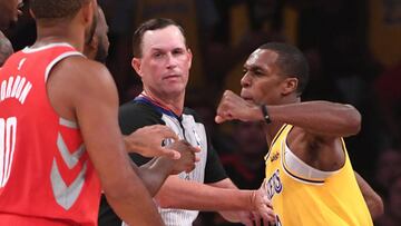 Los Angeles Lakers guard Rajon Rondo (9) throws a punch at Houston Rockets guard Chris Paul (3) during a fight in the fourth quarter of the game at Staples Center.