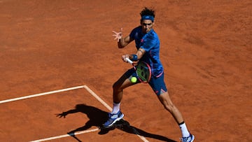 Chile's Alejandro Tabilo returns to Serbia's Novak Djokovic during the Men's ATP Rome Open tennis tournament at Foro Italico in Rome on May 12, 2024. (Photo by Tiziana FABI / AFP)