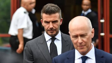 Former England international footballer David Beckham (C) leaves Bromley Magistrates Court in Bromley, south-east of London on May 9, 2019, after being disqualifeid from driving for six months for driving while using a mobile phone. (Photo by Daniel LEAL-