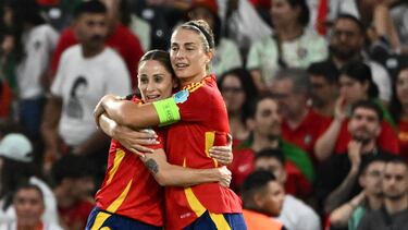 Spain's midfielder #11 Alexia Putellas (R) is congratulated by Spain's forward #09 Esther Gonzalez after scoring her team's third goal during the UEFA Women's Euro 2025 Group B football match between Spain and Portugal at the Wankdorf stadium in Bern, on July 3, 2025. (Photo by SEBASTIEN BOZON / AFP)