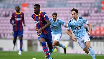 BARCELONA, SPAIN - MAY 16: Ilaix Moriba of FC Barcelona is put under pressure by Denis Suarez of Celta Vigo during the La Liga Santander match between FC Barcelona and RC Celta at Camp Nou on May 16, 2021 in Barcelona, Spain. Sporting stadiums around Spain remain under strict restrictions due to the Coronavirus Pandemic as Government social distancing laws prohibit fans inside venues resulting in games being played behind closed doors. (Photo by David Ramos/Getty Images)