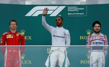 Lewis Hamilton, Sergio Pérez y Kimi Raikkonen en la celebración.