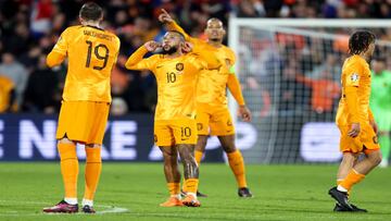 ROTTERDAM, NETHERLANDS - MARCH 27: Memphis Depay of the Netherlands celebrates after scoring his sides first goal during the UEFA EURO 2024 Qualifying Round Group B match between Netherlands and Gibraltar at Stadion Feijenoord on March 27, 2023 in Rotterdam, Netherlands (Photo by Peter Lous/BSR Agency/Getty Images)