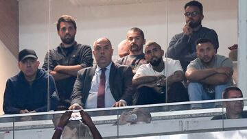 Chilean footballer Arturo Vidal (white t-shirt), who is expected to sign for Brazilian team Flamengo, watches the Copa Libertadores football tournament round of sixteen second leg match between Brazil's Flamengo and Colombia's Deportes Tolima at Macarana Stadium in Rio de Janeiro, Brazil, on July 6, 2022. (Photo by Mauro PIMENTEL / AFP)