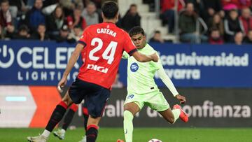 Barcelona's Spanish forward #19 Lamine Yamal shoots and scores his team's second goal during the Spanish league football match between CA Osasuna and FC Barcelona at El Sadar stadium in Pamplona on September 28, 2024. (Photo by Cesar Manso / AFP)