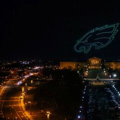 Why do the Philadelphia Eagles wear the color green? What is the origin of their logo?