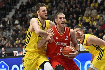 Sweden's Nicholas Spiers (L) and Germany's Dylan Osetkowski in action during the FIBA Men's Eurobasket 2025 qualifiers group D match between Sweden and Germany at Hovet arena in Stockholm, Sweden, 22 November 2024.