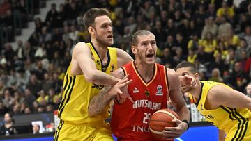 Sweden's Nicholas Spiers (L) and Germany's Dylan Osetkowski in action during the FIBA Men's Eurobasket 2025 qualifiers group D match between Sweden and Germany at Hovet arena in Stockholm, Sweden, 22 November 2024.