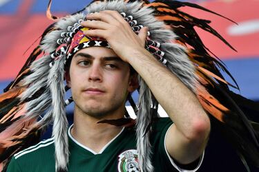 A Mexico fan reacts after the Russia 2018 World Cup round of 16 football match between Brazil and Mexico at the Samara Arena in Samara on July 2, 2018. / AFP PHOTO / Fabrice COFFRINI / RESTRICTED TO EDITORIAL USE - NO MOBILE PUSH ALERTS/DOWNLOADS