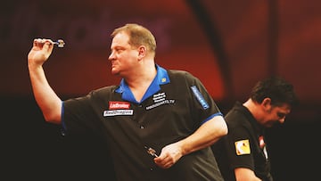 LONDON, ENGLAND - DECEMBER 19: Andy Jenkins of England in action during day 6 of the 2013 Ladbrokes.com World Darts Championship at Alexandra Palace on December 19, 2012 in London, England. (Photo by Bryn Lennon/Getty Images)