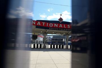 FILE PHOTO: The empty turnstiles at Nationals Park, home of Major League Baseball’s Washington Nationals, are seen on May 13, 2020. REUTERS/Jonathan Ernst/File Photo