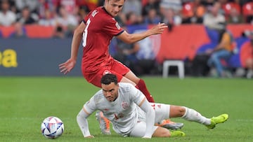 Spain's forward Raul de Tomas (down) and Czech Republic's defender Ales Mateju vie for the ball during the UEFA Nations League - League A Group 2 football match between Czech Republic and Spain at the Sinobo Stadium in Prague, on June 5, 2022. (Photo by Michal Cizek / AFP)