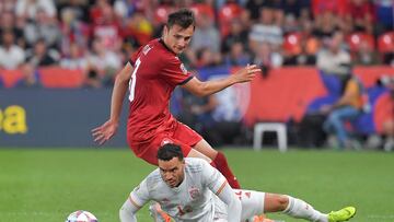 Spain's forward Raul de Tomas (down) and Czech Republic's defender Ales Mateju vie for the ball during the UEFA Nations League - League A Group 2 football match between Czech Republic and Spain at the Sinobo Stadium in Prague, on June 5, 2022. (Photo by Michal Cizek / AFP)