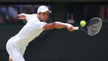 Tennis - Wimbledon - All England Lawn Tennis and Croquet Club, London, Britain - July 9, 2023 Colombia's Daniel Elahi Galan in action during his fourth round match against Italy's Jannik Sinner REUTERS/Toby Melville