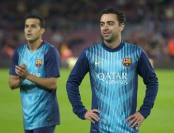 Homenaje a Xavi por sus 700 partidos con el Barça.