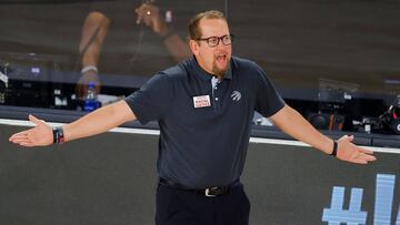 (FILES) In this file photo taken on August 19, 2020, coach Nick Nurse of the Toronto Raptors reacts against the Brooklyn Nets in Game Two of the Eastern Conference First Round during the 2020 NBA Playoffs  in Lake Buena Vista, Florida. NOTE TO USER: User expressly acknowledges and agrees that, by downloading and or using this photograph, User is consenting to the terms and conditions of the Getty Images License Agreement. - Nurse was named NBA Coach of the Year for the 2019-20 season on August 22, 2020, with his club still defending the crown. Nurse, a 53-year-old American, won the award for the first time in his second season guiding the Raptors, who went 53-19 in this COVID-19 disrupted campaign, the second-best record in the league. (Photo by Kevin C. Cox / GETTY IMAGES NORTH AMERICA / AFP)