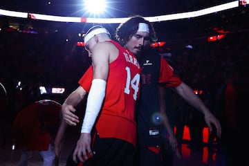 MIAMI, FLORIDA - DECEMBER 23: Tyler Herro #14 and Jaime Jaquez Jr. #11 of the Miami Heat embrace on the court prior to a game against the Brooklyn Nets at Kaseya Center on December 23, 2024 in Miami, Florida. NOTE TO USER: User expressly acknowledges and agrees that, by downloading and or using this photograph, User is consenting to the terms and conditions of the Getty Images License Agreement.   Megan Briggs/Getty Images/AFP (Photo by Megan Briggs / GETTY IMAGES NORTH AMERICA / Getty Images via AFP)