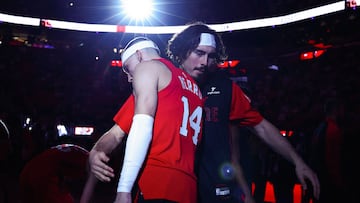 MIAMI, FLORIDA - DECEMBER 23: Tyler Herro #14 and Jaime Jaquez Jr. #11 of the Miami Heat embrace on the court prior to a game against the Brooklyn Nets at Kaseya Center on December 23, 2024 in Miami, Florida. NOTE TO USER: User expressly acknowledges and agrees that, by downloading and or using this photograph, User is consenting to the terms and conditions of the Getty Images License Agreement. Megan Briggs/Getty Images/AFP (Photo by Megan Briggs / GETTY IMAGES NORTH AMERICA / Getty Images via AFP)