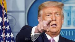 Donald Trump takes questions as he speaks during a briefing on the coronavirus disease (COVID-19) pandemic at the White House in Washington.