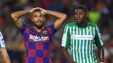 BARCELONA, SPAIN - AUGUST 25: Rafinha of Barcelona and Emerson de Souza of Real Betis look on during the Liga match between FC Barcelona and Real Betis at Camp Nou on August 25, 2019 in Barcelona, Spain. (Photo by Alex Caparros/Getty Images)